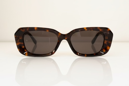 Sunglasses with tortoiseshell frame on black. for all women. 