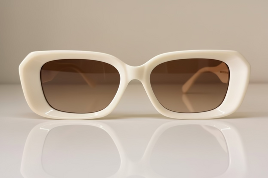 Rectangular sunglasses with light beige color, on temple and lens, the fabulous style, all day wearable, marbella lifestyle